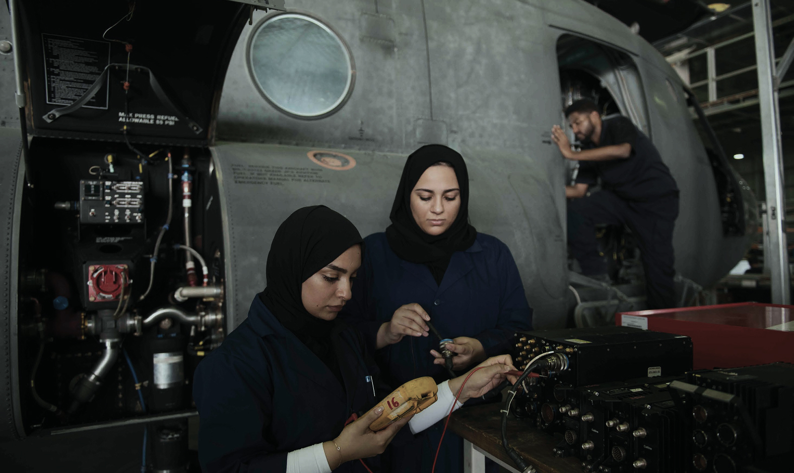 Emirati aerospace specialists working on aircraft systems