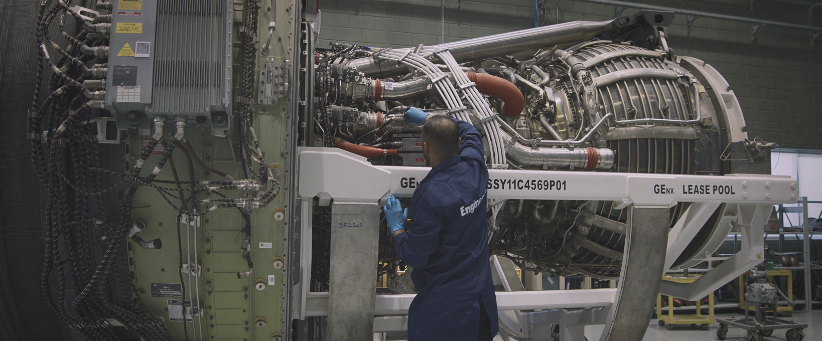 Aviation specialist working on an aircraft engine